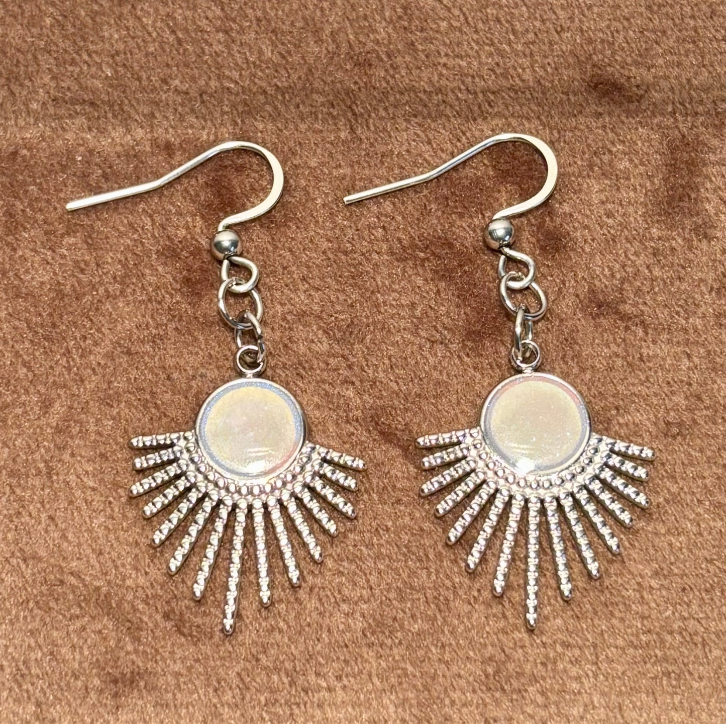Boucles d’oreilles soleil argentées