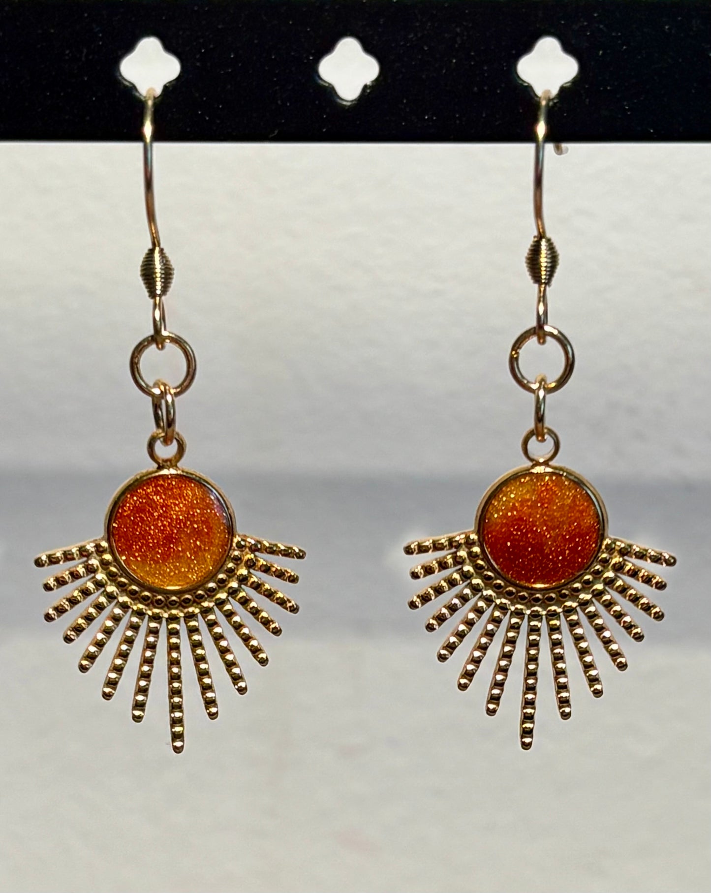Boucles d’oreilles soleil dorées