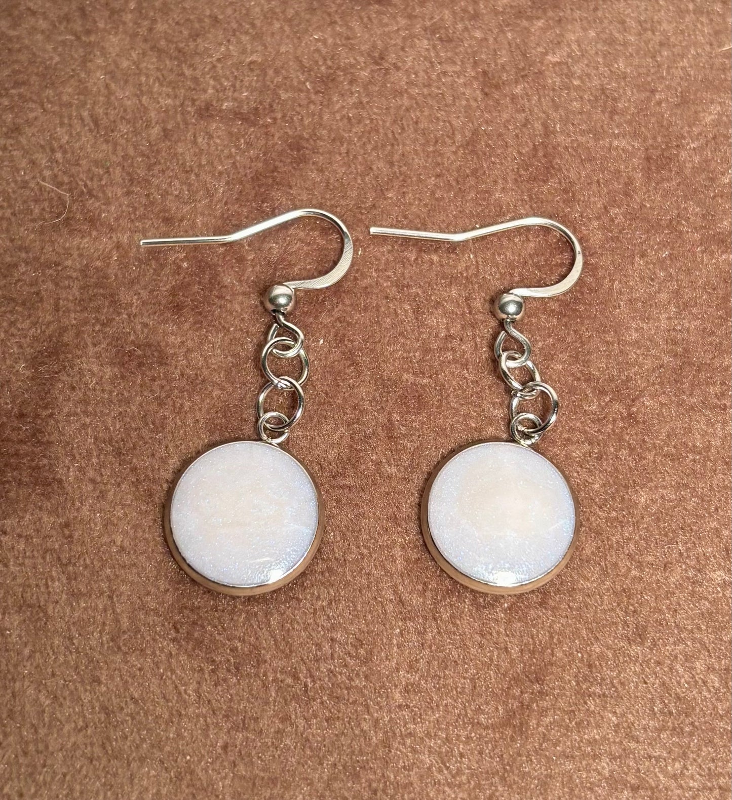 Boucles d’oreilles pendantes perle bleue